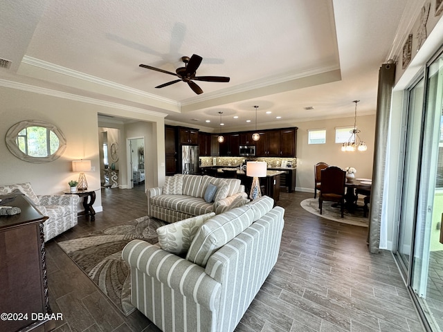 room details with backsplash, light stone counters, dark brown cabinets, and beverage cooler