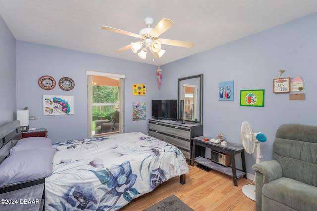 bedroom with ceiling fan and wood-type flooring