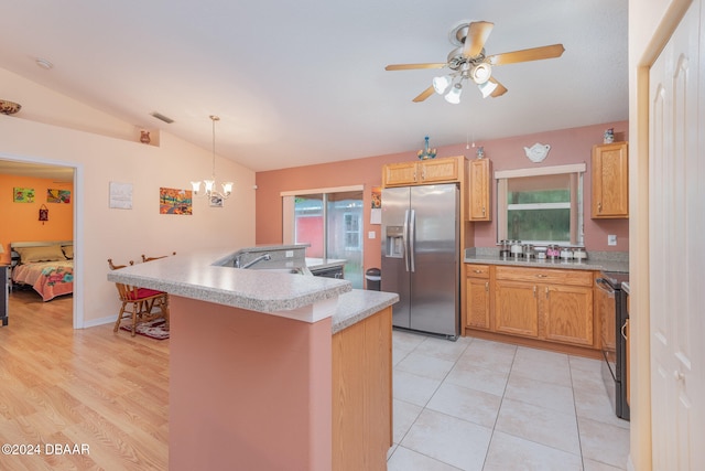 kitchen with stainless steel refrigerator with ice dispenser, light wood-type flooring, vaulted ceiling, a kitchen island with sink, and hanging light fixtures