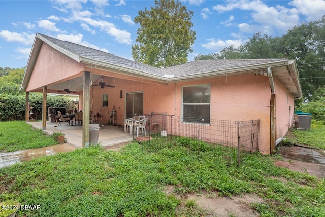 rear view of house with a patio area and ceiling fan