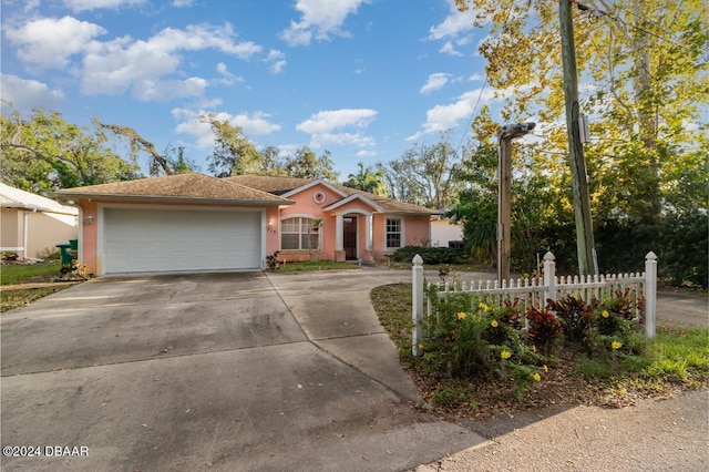 ranch-style home with a garage