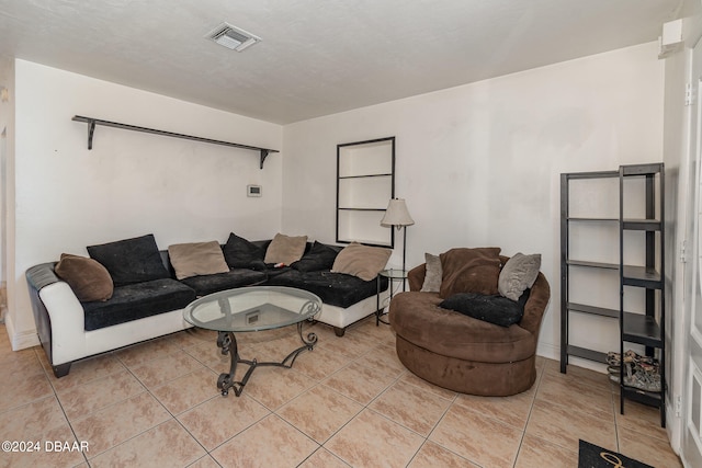 living room with light tile patterned floors