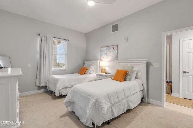 bedroom featuring ceiling fan and light colored carpet