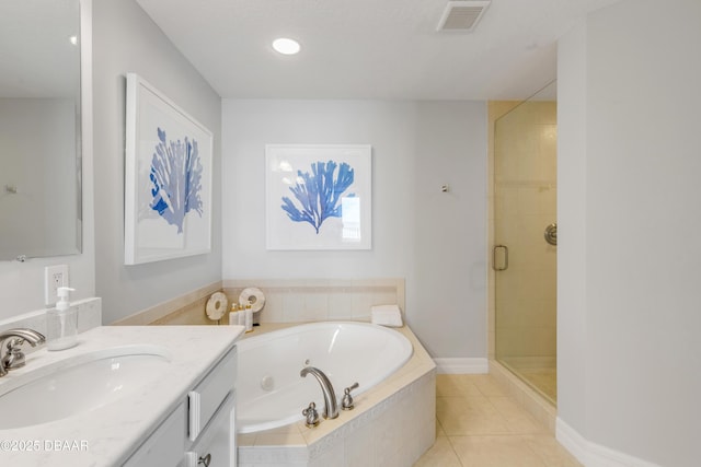 bathroom with shower with separate bathtub, tile patterned floors, and vanity