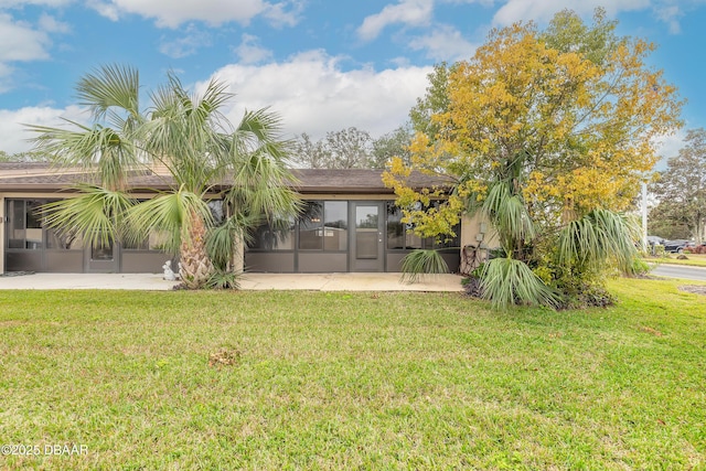 1260 Charter Oaks Cir, Holly Hill, FL 32117 - view of yard with a patio and a sunroom