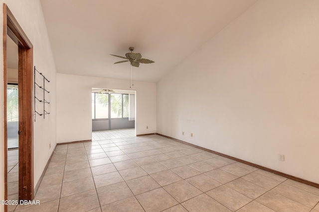 1260 Charter Oaks Cir, Holly Hill, FL 32117 - spare room with light tile patterned floors, vaulted ceiling, and ceiling fan