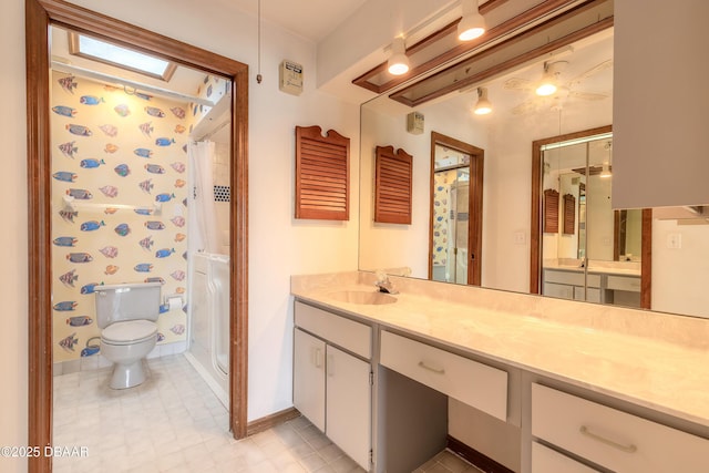 1260 Charter Oaks Cir, Holly Hill, FL 32117 - bathroom with a shower with curtain, vanity, a skylight, and toilet