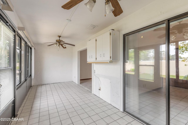 1260 Charter Oaks Cir, Holly Hill, FL 32117 - interior space featuring light tile patterned floors, plenty of natural light, and ceiling fan