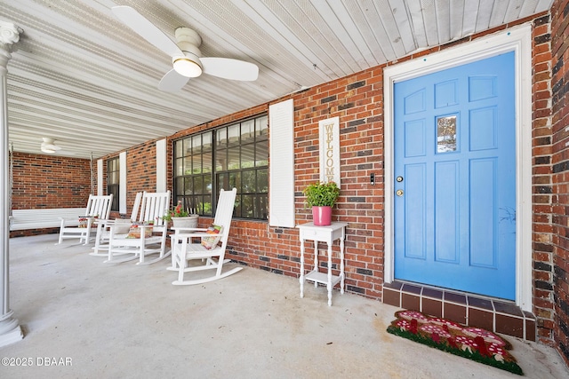 1 River Bluff Ct, Ormond Beach, FL 32174 - view of exterior entry featuring a porch, brick siding, and ceiling fan