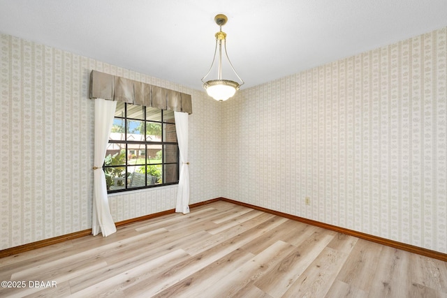 1 River Bluff Ct, Ormond Beach, FL 32174 - unfurnished room featuring wood finished floors and baseboards