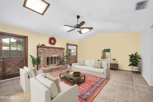 1 River Bluff Ct, Ormond Beach, FL 32174 - living area featuring a ceiling fan, plenty of natural light, vaulted ceiling, and light tile patterned floors