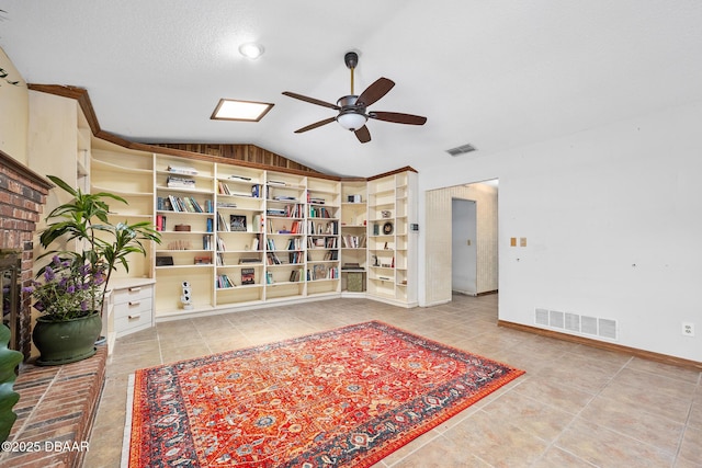 1 River Bluff Ct, Ormond Beach, FL 32174 - living area with ceiling fan, lofted ceiling, and tile patterned flooring