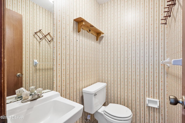 1 River Bluff Ct, Ormond Beach, FL 32174 - bathroom featuring a sink and toilet