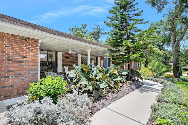 1 River Bluff Ct, Ormond Beach, FL 32174 - doorway to property featuring covered porch and brick siding