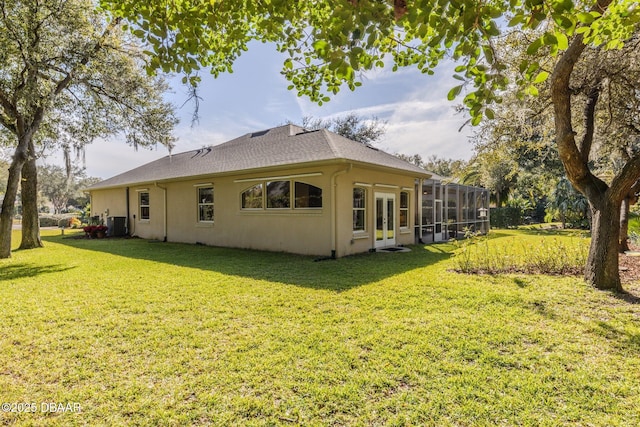 back of house with a yard