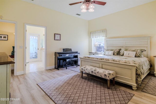 bedroom featuring ceiling fan and light hardwood / wood-style flooring