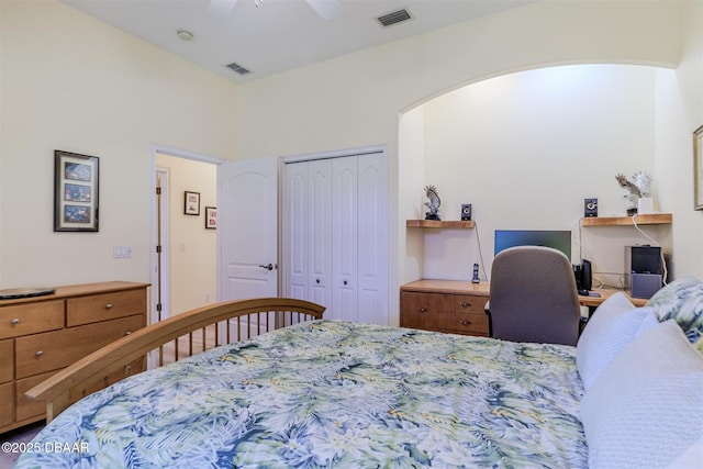 bedroom with ceiling fan and a closet