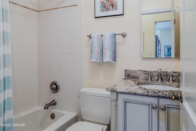 full bathroom featuring vanity, toilet, and shower / tub combo with curtain