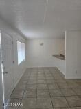 415 N Halifax Ave Unit 109, Daytona Beach, FL 32118 - unfurnished room featuring tile patterned flooring