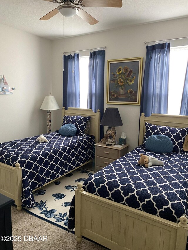 1601 Delphi Way, New Smyrna Beach, FL 32168 - bedroom with carpet floors and ceiling fan