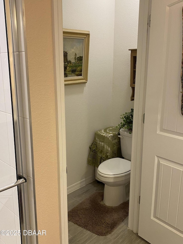 1601 Delphi Way, New Smyrna Beach, FL 32168 - bathroom with toilet and wood finished floors