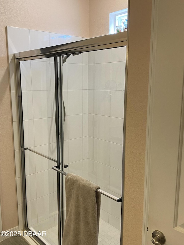 1601 Delphi Way, New Smyrna Beach, FL 32168 - full bath featuring a stall shower and a textured wall