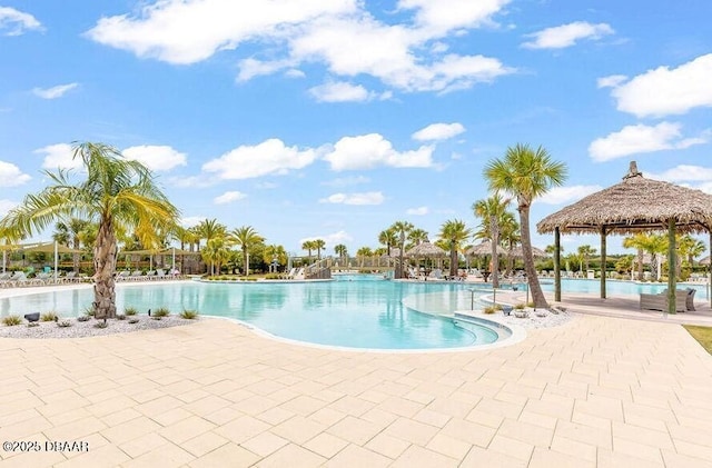 view of swimming pool with a gazebo