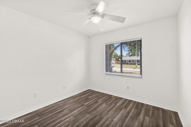 1197 Stillwood Ct, Port Orange, FL 32129 - spare room with a ceiling fan, baseboards, and dark wood-type flooring