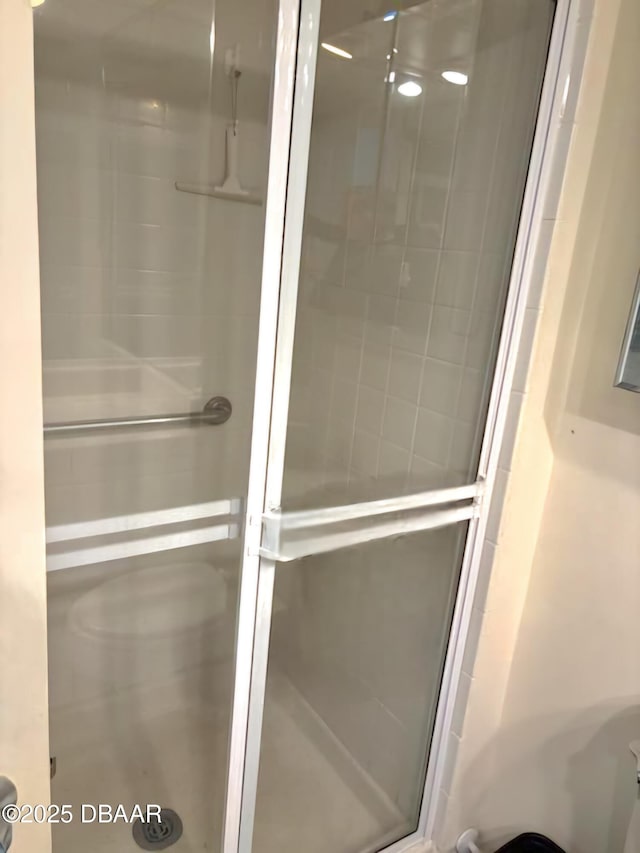 bathroom featuring walk in shower