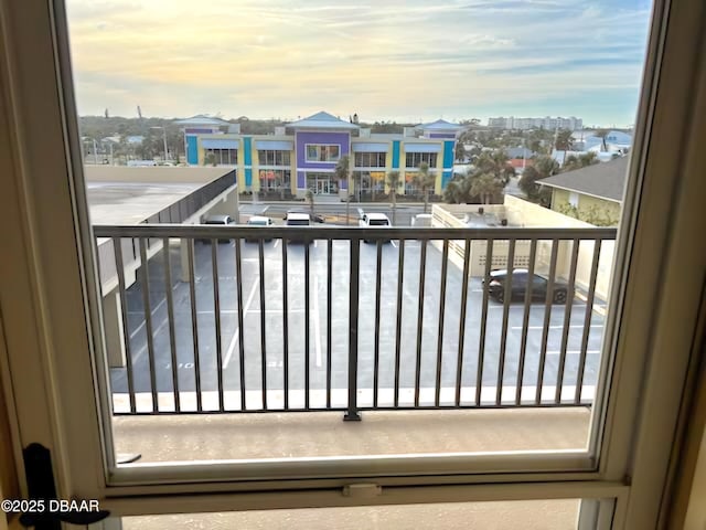 view of balcony at dusk