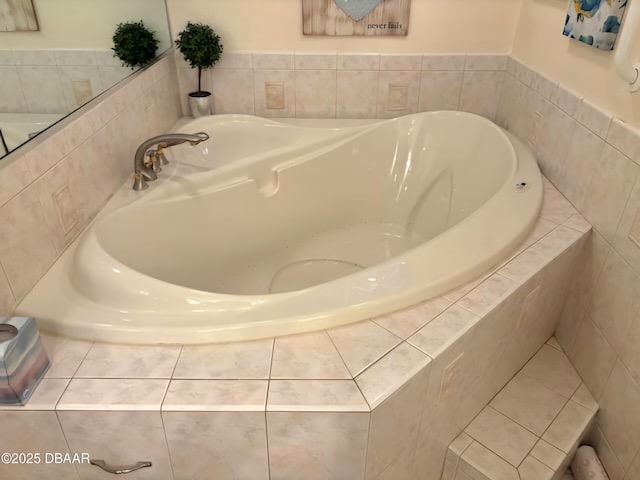 bathroom with tiled bath