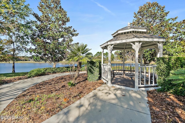 view of home's community featuring a gazebo and a water view