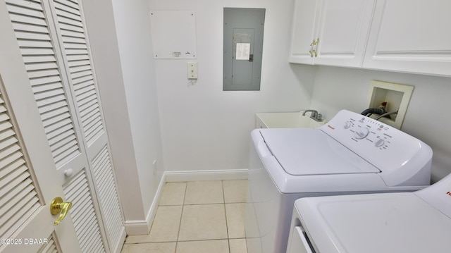 laundry room with washer and dryer, sink, cabinets, light tile patterned floors, and electric panel