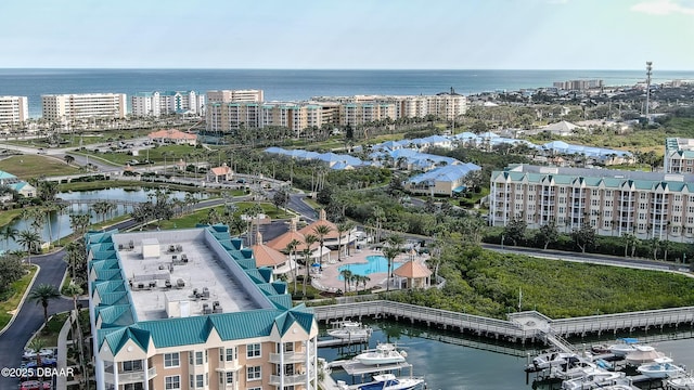 birds eye view of property featuring a water view