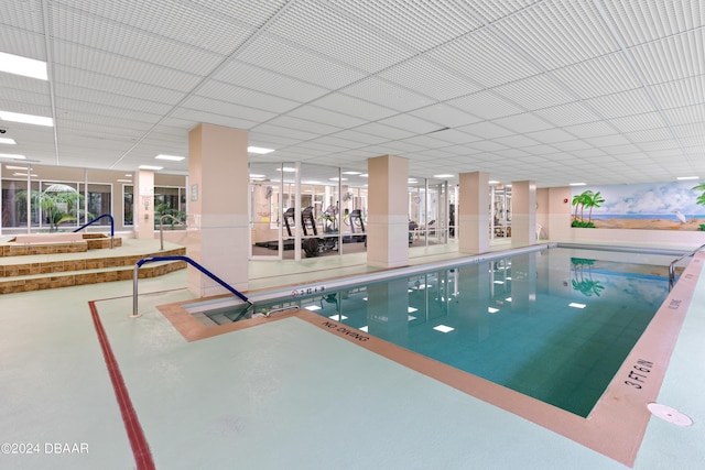 view of pool with a jacuzzi