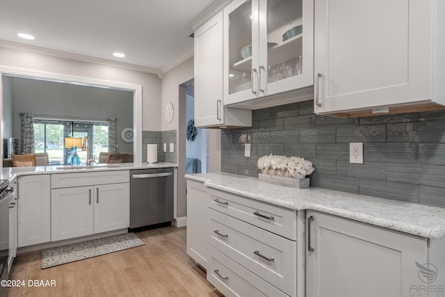 kitchen featuring crown molding, sink, light hardwood / wood-style floors, white cabinets, and dishwasher