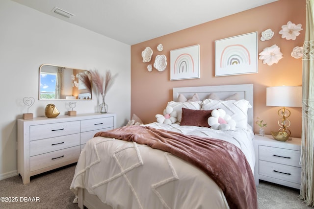 bedroom featuring light carpet