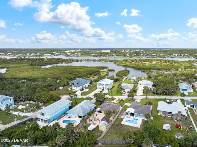1942 N Daytona Ave, Flagler Beach, FL 32136 - aerial perspective of suburban area with a large body of water and a pool