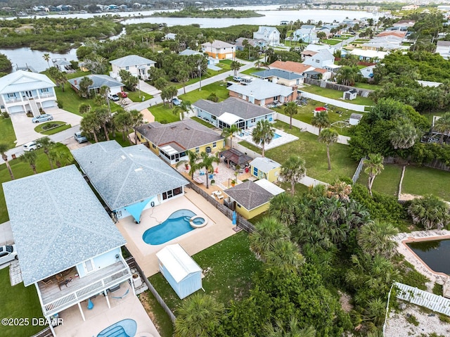 1942 N Daytona Ave, Flagler Beach, FL 32136 - aerial view of residential area featuring a nearby body of water and a pool area