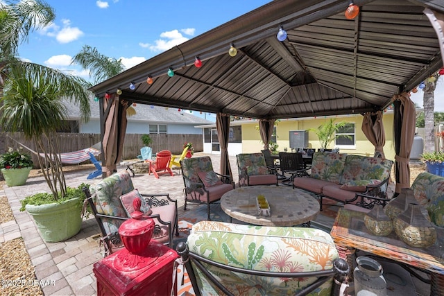 1942 N Daytona Ave, Flagler Beach, FL 32136 - view of patio / terrace with a gazebo and an outdoor living space