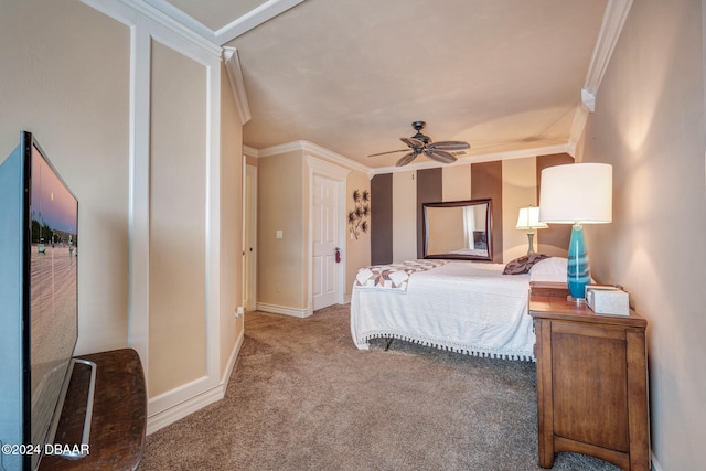 bedroom featuring ceiling fan, crown molding, and carpet floors