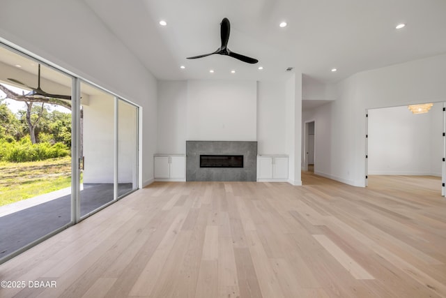 unfurnished living room with light wood-style flooring, recessed lighting, and ceiling fan