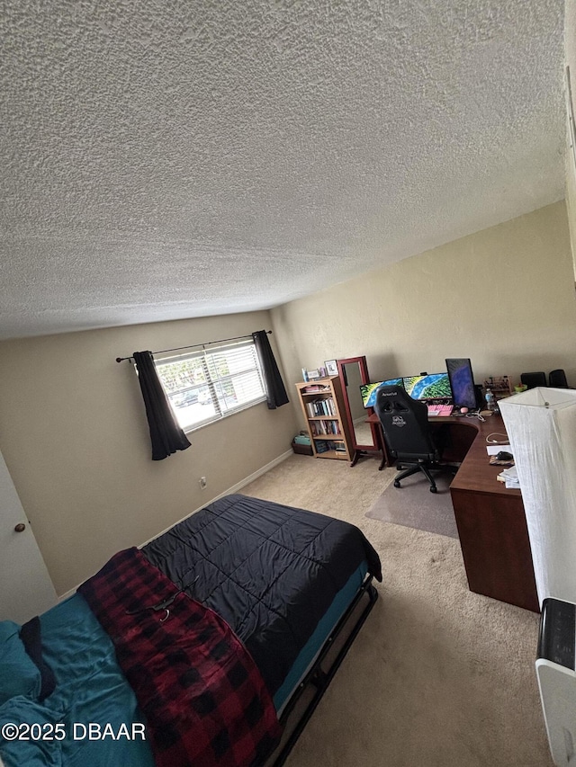 65 Seton Trl Unit 8, Ormond Beach, FL 32176 - carpeted bedroom with a desk and a textured ceiling