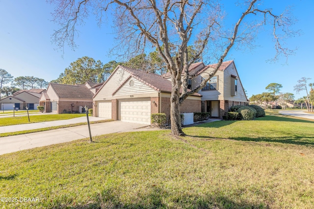 view of front facade with a garage and a front yard