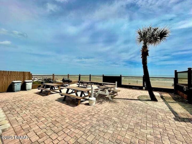 view of patio / terrace with a water view