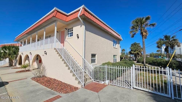 view of home's exterior featuring a balcony