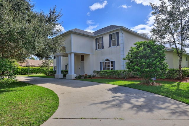 view of front of home featuring a front yard