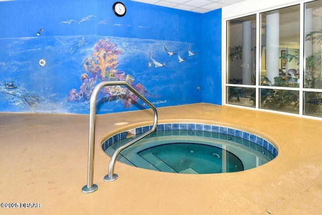 view of swimming pool featuring an indoor in ground hot tub