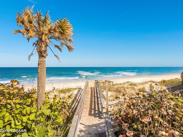view of water feature with a beach view