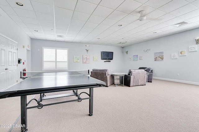 playroom featuring a paneled ceiling, visible vents, light carpet, and baseboards